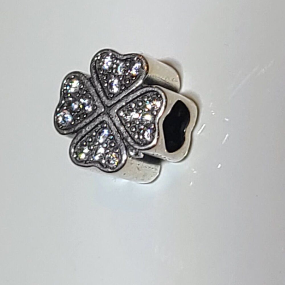 Four hearts charm